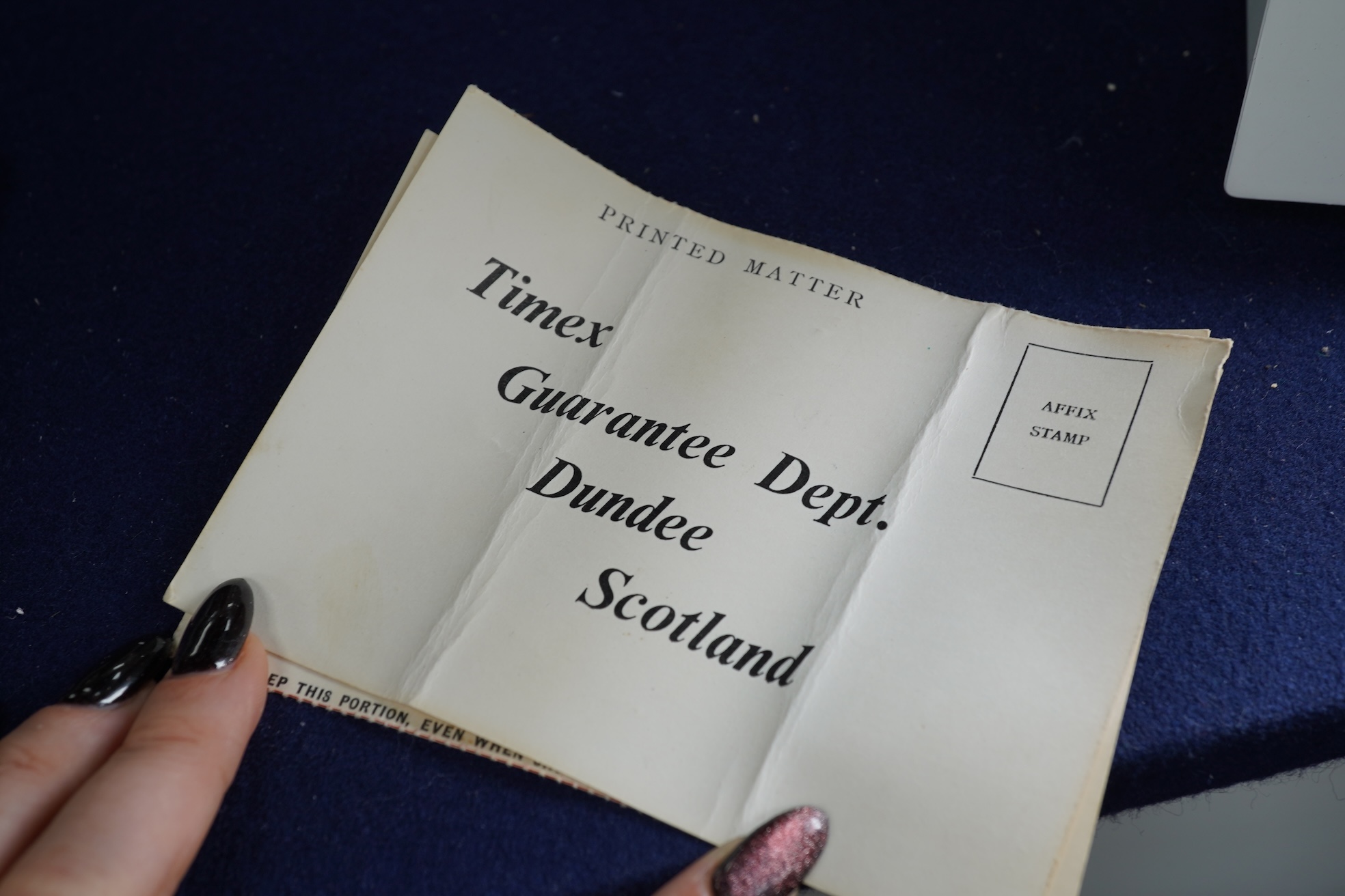 Two 1950s manual wind wrist watches; a gentleman’s stainless steel wristwatch by P. Buhre, retailed by the Goldsmiths & Silversmiths Company Ltd. case diameter 34mm, no strap, together with a Timex watch with box and pap